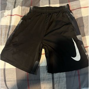 Black Nike shorts with gray accents
